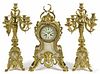 French ormolu and marble three-piece clock garniture, late 19th c., with Vincenti works