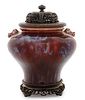 Chinese Oxblood Lidded Urn on Wooden Stand