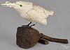 Japanese carved ivory bird, late 19th c., clutching a fish in its beak, mounted on a boxwood perch