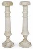 Pair of Italian alabaster pedestals, 20th c., in two parts, each with a reeded column