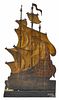 Continental carved and painted galleon-form fireboard, ca. 1900, 42'' h., 23 3/4'' w.