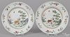 Pair of Chinese famille rose porcelain plates, late 18th c., decorated with a woman with an ox