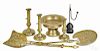 Metalware, to include a rush light holder, three brass candlesticks, a footed bowl