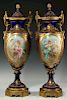 A GOOD PAIR OF 22-INCH SEVRES TYPE URNS SIGNED ROLLI