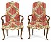 Pair of George II style mahogany open armchairs.