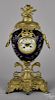 French ormolu mounted porcelain mantel clock, late 19th c., 21 1/2'' h.