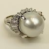 Lady's South Sea Pearl, Approx. 1.25 Carat Diamond and Platinum Ring.