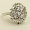 Lady's Vintage Approx. 3.50 Carat Round Brilliant Cut and Baguette Cut Diamond and 14 Karat White Gold Dome Ring.