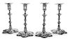 A Set of Four George II Silver Candlesticks, John Cafe, London, 1752, each having a candle cup surmounting a foliate and knopped