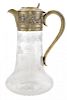 A Victorian Gilt-Silver and Cut Glass Wine Ewer, John Crane Salt, London, 1878, the gilt lid decorated with putti in an Arcadian