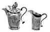 Two Polish Silver Creamers, 18th Century, the larger example lidded and having a finial in the form of a putto's head, both engr