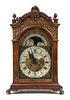 A George II Style Burlwood Bracket Clock Height 18 3/4 inches.