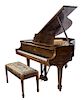 * A Steinway and Sons Baby Grand Piano Length 64 inches.