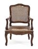 A Louis XV Style Provincial Child's Fauteuil Height 23 1/4 inches.