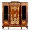 A Louis XVI Style Gilt Bronze Mounted Mahogany and Fruitwood Vitrine Cabinet Height 62 1/2 x width 57 1/2 x depth 16 1/2 inches.