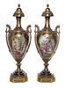 * A Pair of Sevres Gilt Bronze Mounted Porcelain Urns Height 29 inches.