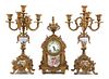 A Sevres Style Porcelain Mounted Gilt Bronze Clock Garniture Height of candelabra 18 inches.