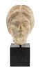 A Roman Marble Portrait Head of a Woman Height 9 1/4 inches.