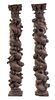 * A Pair of Continental Carved Columns Height 75 1/2 inches.