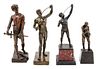 * A Group of Four Continental Bronze and Cast Metal Figures Height of first 12 1/2 inches.