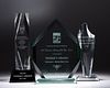 Three glass achievement awards presented to Thomas V. Girardi