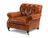 A tufted leather club armchair