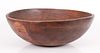 A large primitive maple turned mixing bowl