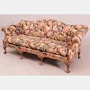 A Chippendale Style Carved Mahogany Camel-Back Sofa, 20th Century,