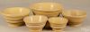 Nesting set of five yelloware mixing bowls, 19th c., largest - 6'' h., 12 1/2'' dia.