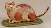 Walter Gottshall, carved and painted figure of a cat on a rug, initialed and dated '88, 5'' h.