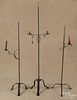 Three contemporary wrought iron floor candlestands, tallest - 69 1/2''.