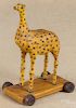 Walter Gottshall, carved and painted giraffe pull toy, initialed and dated 1981, 9 1/2'' h.