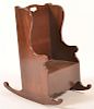 Mahogany Settle Form Child's Rocking Chair.