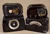 Four plastic radios, mid 20th c., to include Fada bullet, RCA, Philco, and Zenith