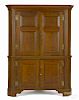 Pennsylvania Chippendale walnut corner cupboard, ca. 1790, in two parts, with raised panel doors