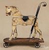 Painted horse push toy, ca. 1900, 23 1/2'' h., 21 3/4'' l.