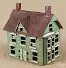 Primitive painted doll house, ca. 1900, made from a shipping crate, 10 1/4'' h., 12'' w.
