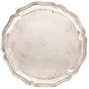 PLATO MÉXICO, SIGLO XIX Elaborado en plata. Marcado con burilada. Ribete decorado con motivos orgánicos Peso: 1159.5 g