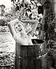 Bunny Yeager Photograph of Woman in Barrel