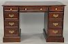 Hekman mahogany knee hole desk with leather top, ht. 30", wd. 48", dp. 25".