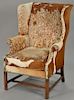Hyde upholstered Chippendale style wing chair (some wear).