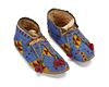 A pair of Plains Indian beaded hide moccasins