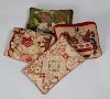 Three Needlework Pillows and a Tapestry-Fronted Pillow