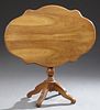 French Carved Walnut Tilt Top Center Table, early
