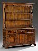 English Carved Oak Welsh Cupboard, late 19th c., w