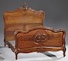 Louis XV Style Carved Walnut Bed, early 20th c., t