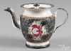 Black and brown rainbow spatter teapot with Adams rose decoration, 7'' h.