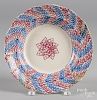 Blue and red sponge spatter soup bowl with star decoration, 10 3/8'' dia.