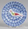 Blue spatter plate with peafowl decoration, 8 3/8'' dia.