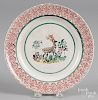 Red stick spatter plate with stag decoration, 9 1/8'' dia.